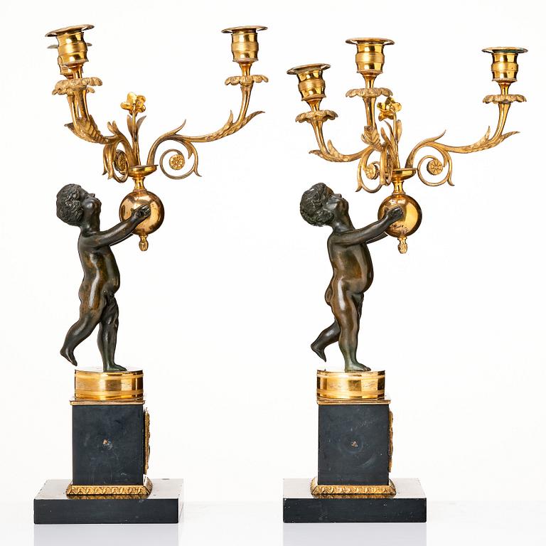 A pair of late Gustavian candelabra.