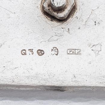 A pair of Swedish silver candlesticks, marks of Gustaf Folcker, Stockholm 1825.