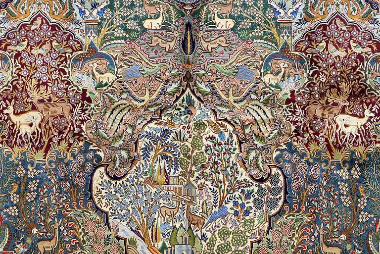 A Kashmar figural carpet. Circa 390 x 300 cm.