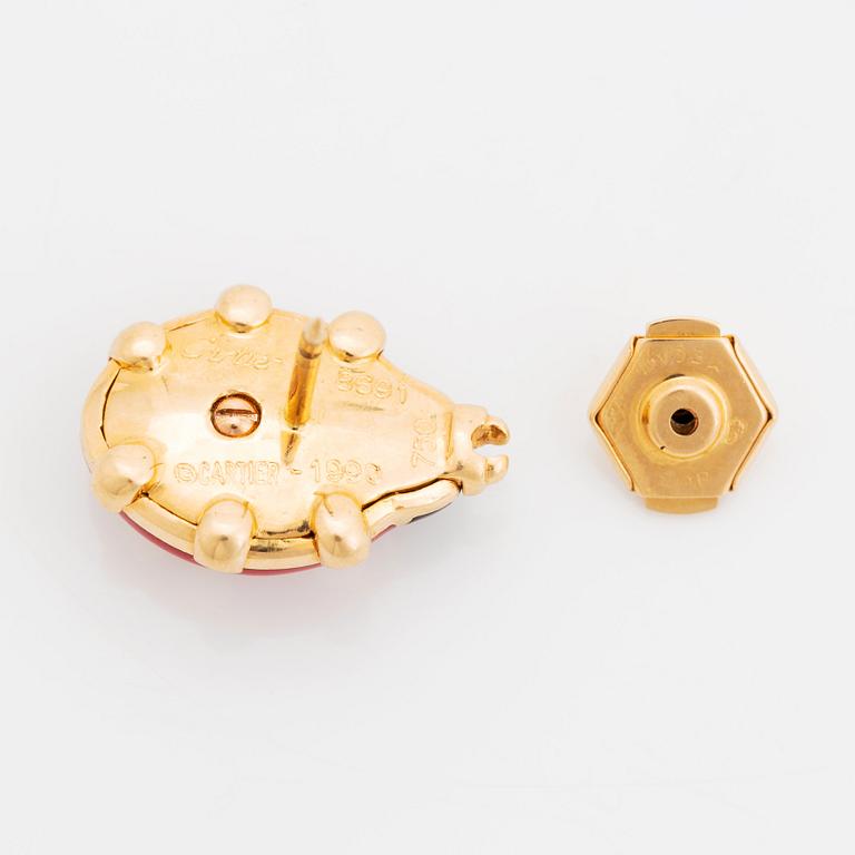 An 18K gold and enamel lady bug Cartier brooch.