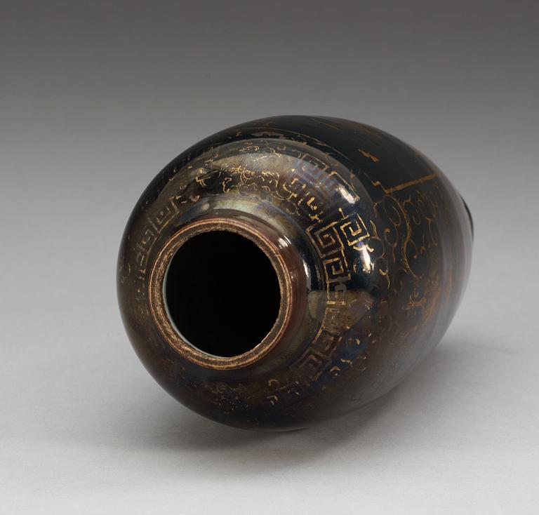 A gilt black vase, Qing dynasty, 18th Century, with Kangxis six character mark.