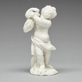 FIGURIN, porslin. Marieberg, 1700-tal. "Putto med sädeskärve".