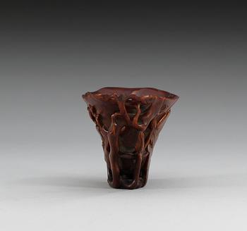 A rhinoceros horn libation cup, Qing dynasty, Kangxi (1662-1722).