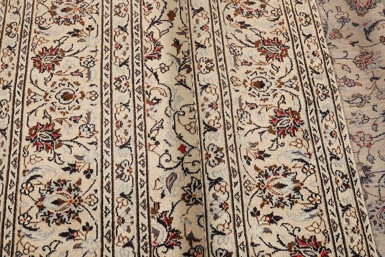 A carpet, Kashan, ca 340 x 238 cm.
