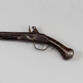 A Danish flint lock pistol signed, (Paul Nielsen Norrman, ca 1700).