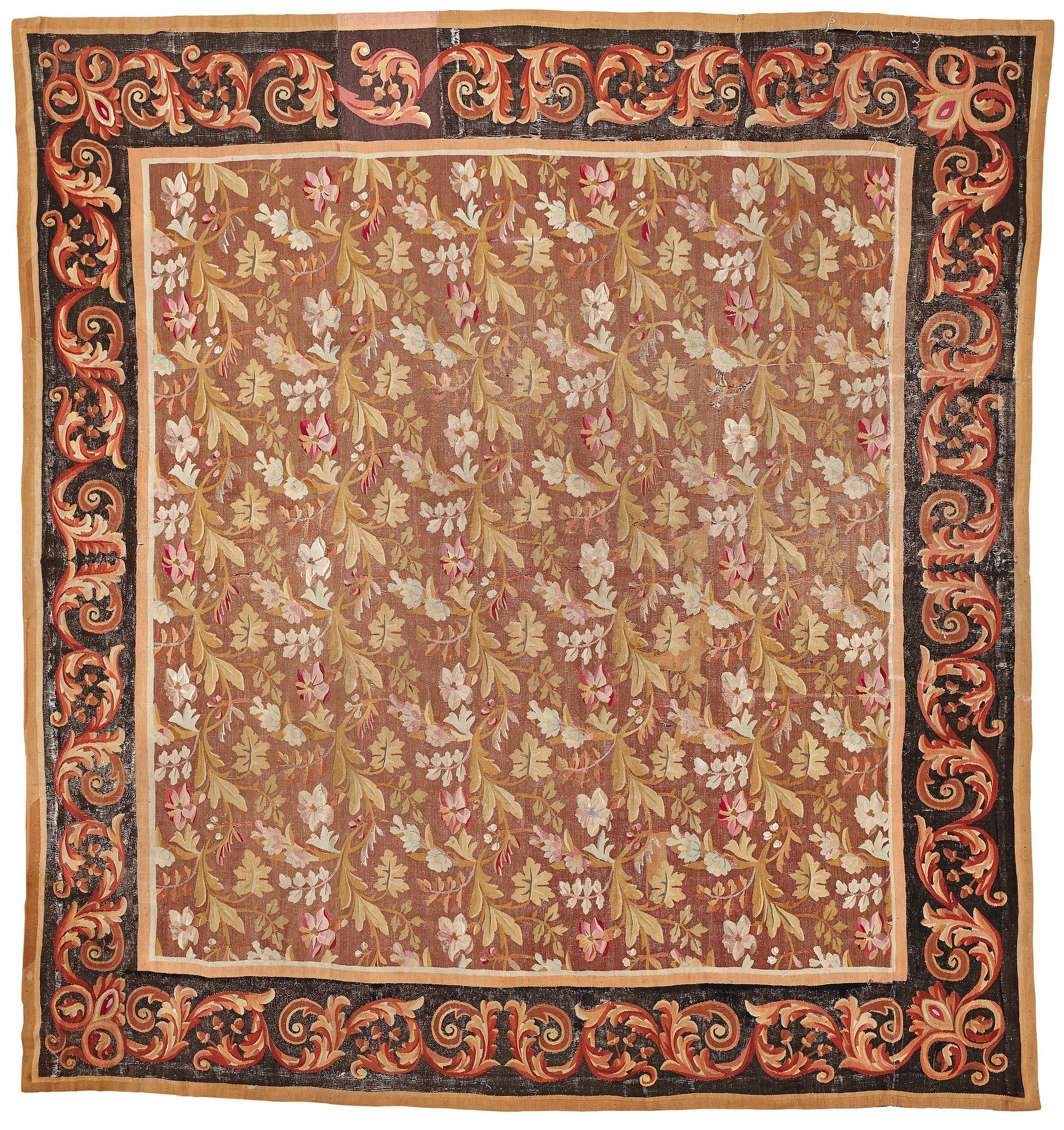 A CARPET, tapestry weave, ca 415,5-419 x 392-396 cm, Aubusson, France, the age of Louis Philippe, around 1840.