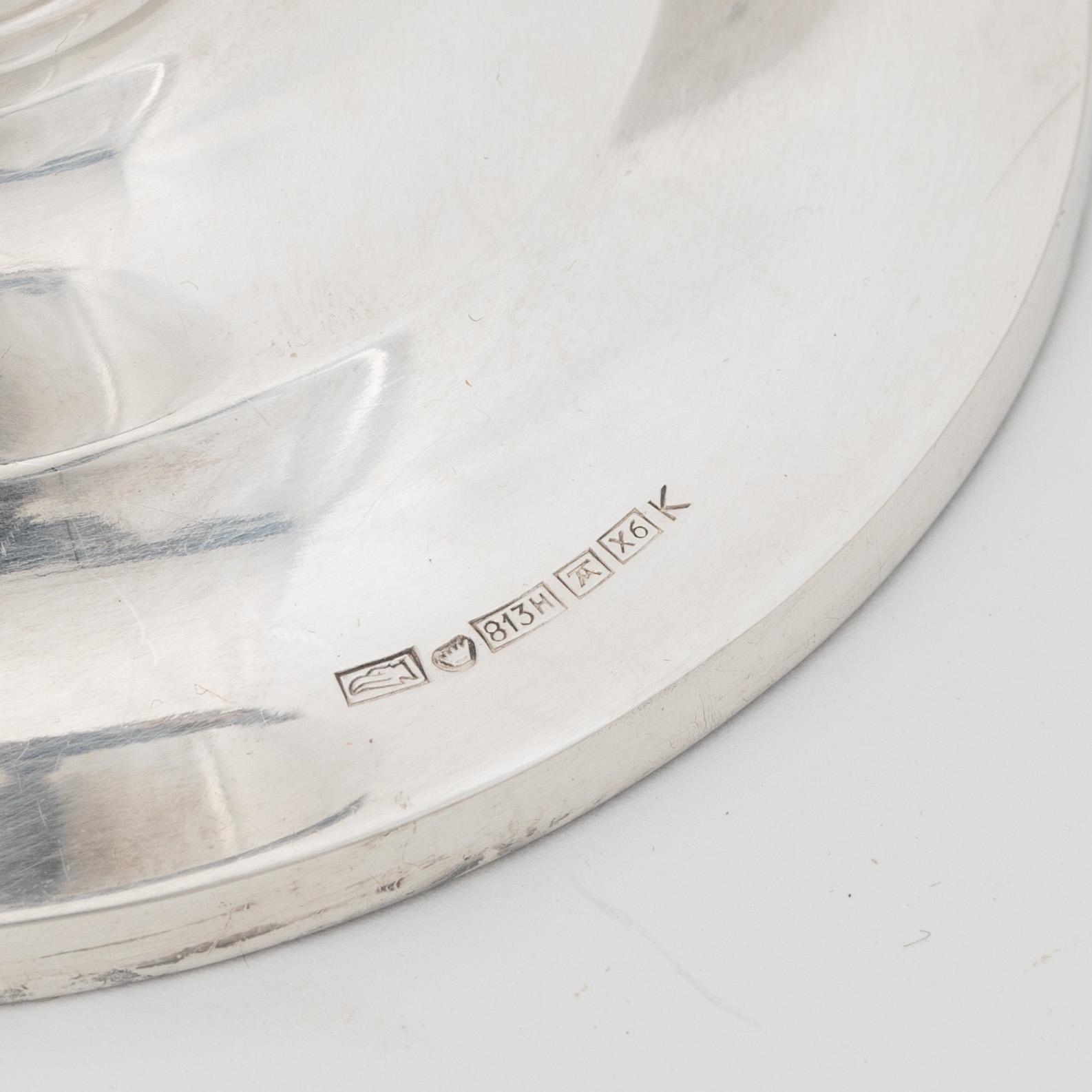 Three pairs of silver candlesticks, Finnish and Swedish hallmarks 1927-1972.