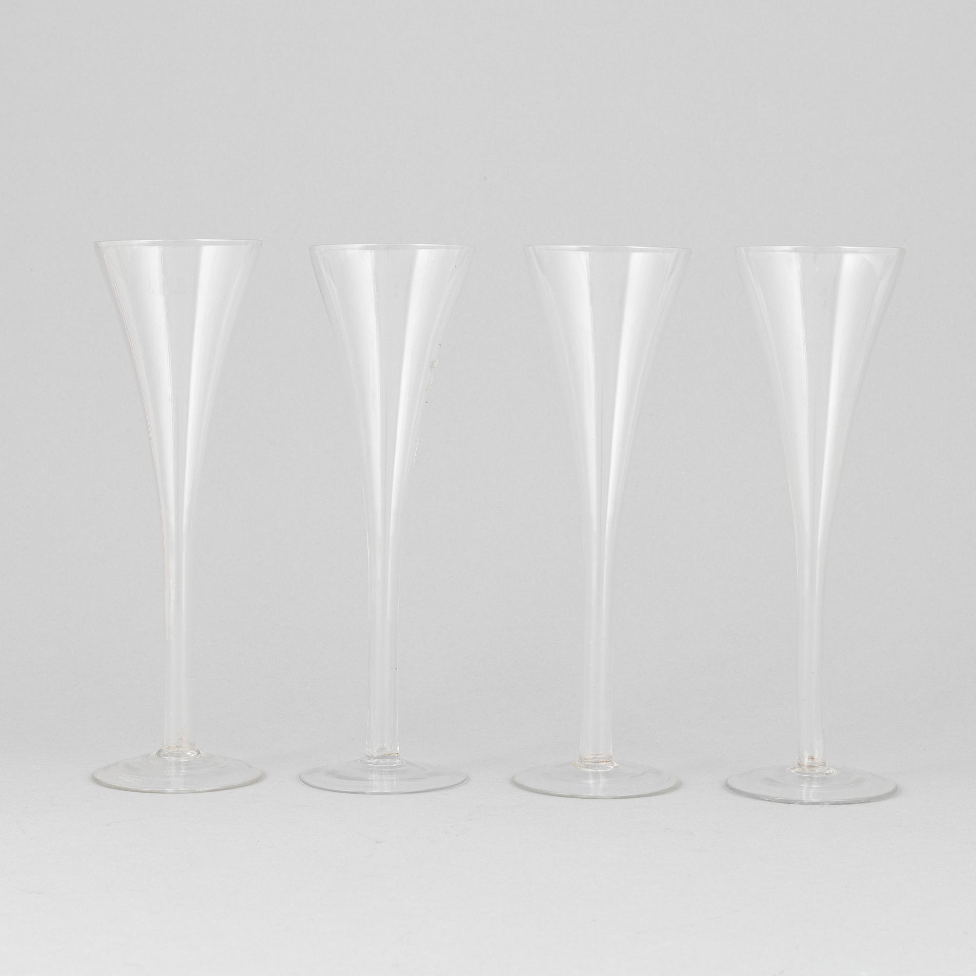 A set of four 19th century champagne flutes.