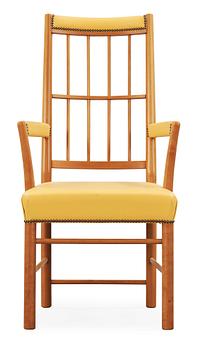 328. A Josef Frank cherry and yellow leather armchair, Svenskt Tenn, model 652.