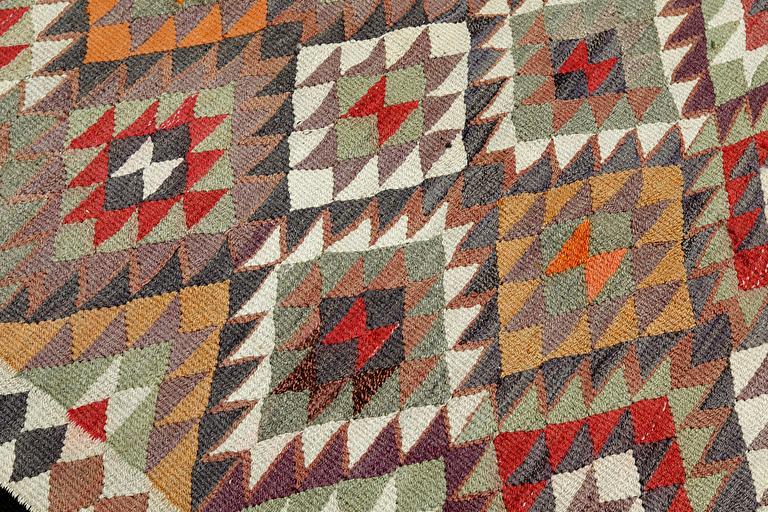 A Nomad Kilim carpet, approx. 265 x 150 cm.