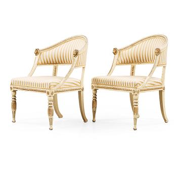 1219. A pair of late Gustavian early 19th century armchairs.