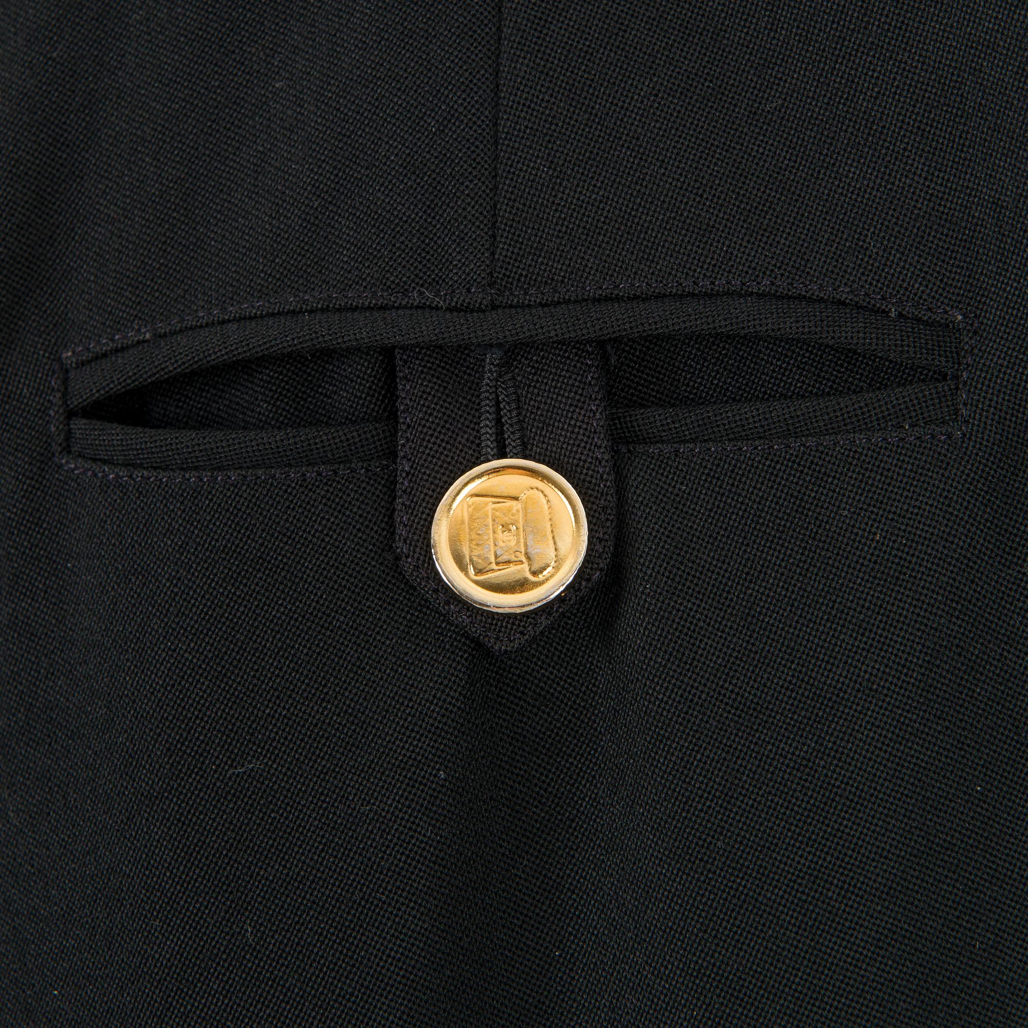 SKIRT AND A PAIR OF TROUSERS.