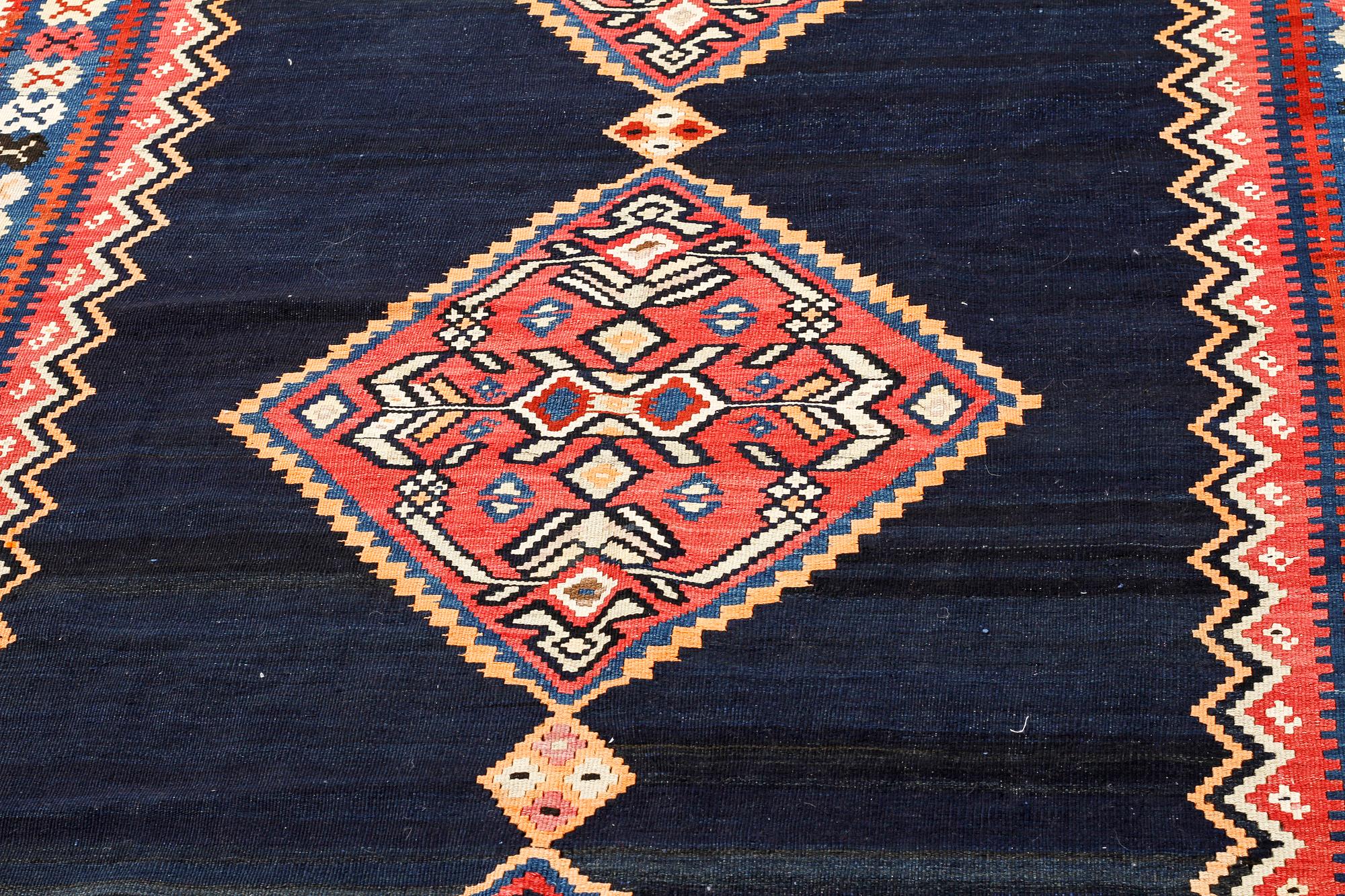 A kelim rug, 342 x 150 cm.