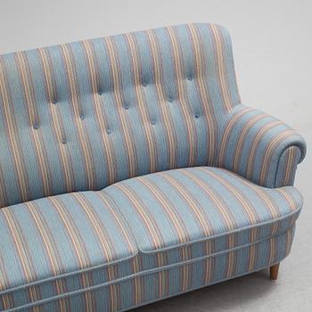 A Carl Malmsten"Hemmakväll" sofa from late 20th century.