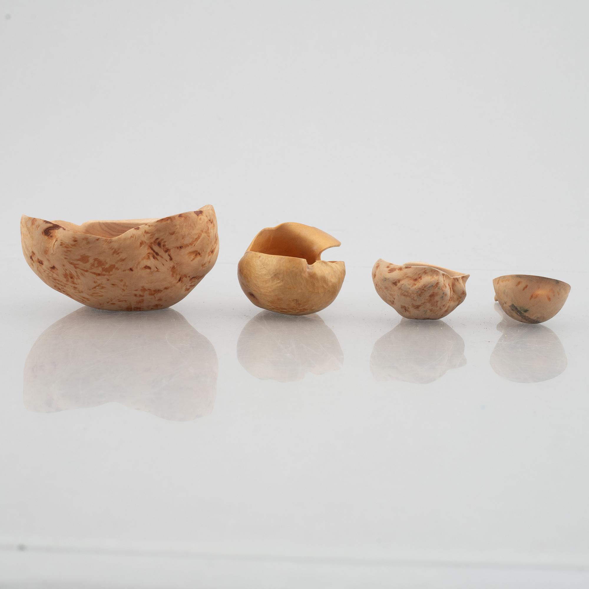 Ten carved burl wood bowls and cups, Sweden, 20th century.