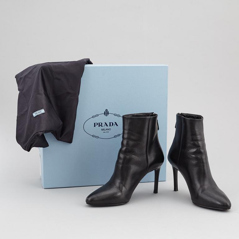 PRADA, a pair of black leather boots, size 35.