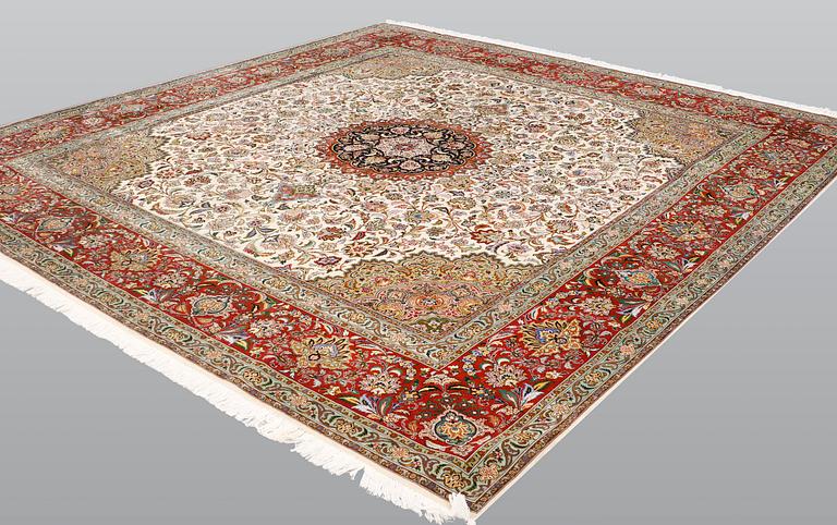 A part silk Tabriz carpet, sk 50 Radj, ca 312 x 296 cm.