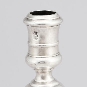 A pair of Italian late 17th/early 18th Century silver candlesticks. Marks of Johann Adolf Gaap (born 1667, died 1724).