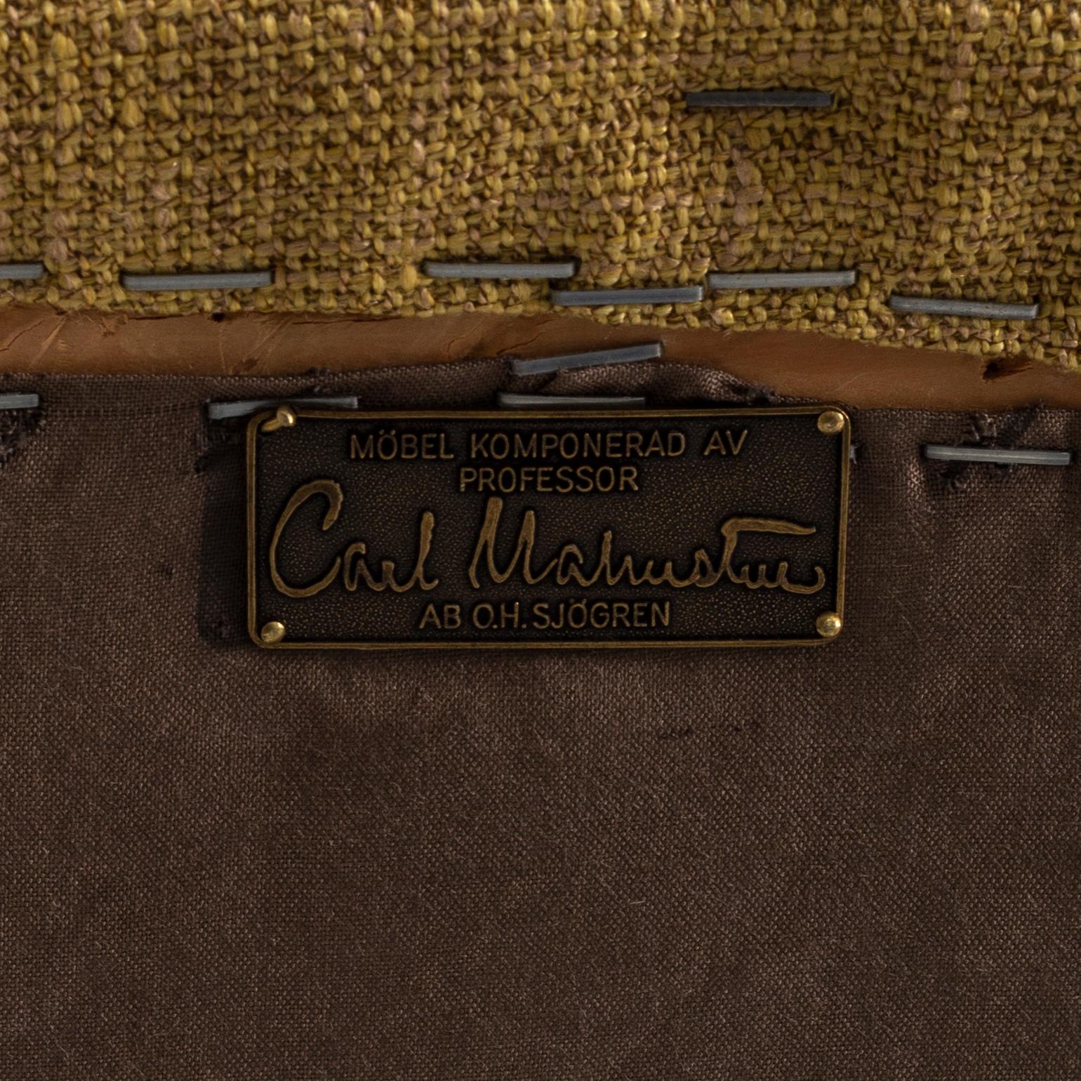 A Carl Malmsten ' farmor' chair.