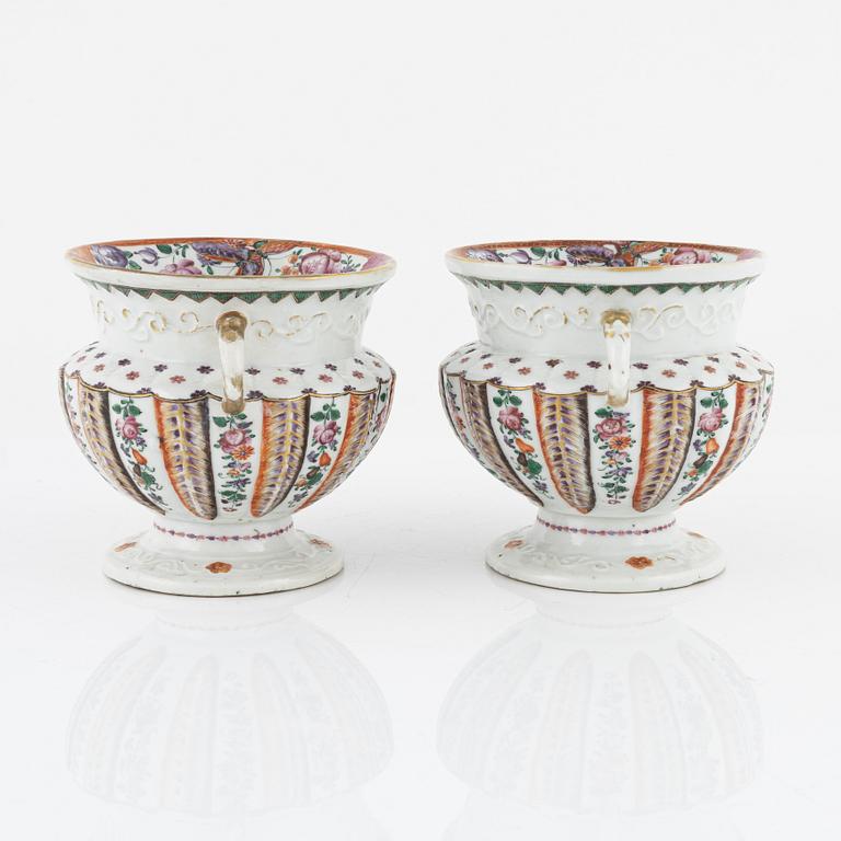 A pair of famille rose flower pots, Qing dynasty, Qianlong (1736-95).