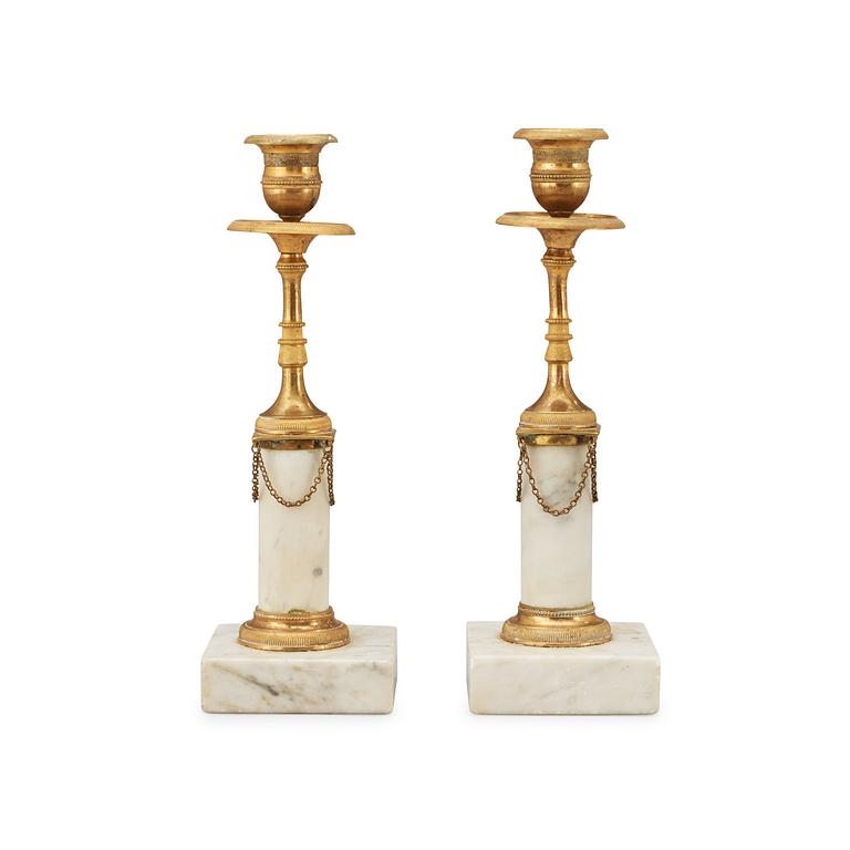 A pair of late Gustavian late 18th century candlesticks.