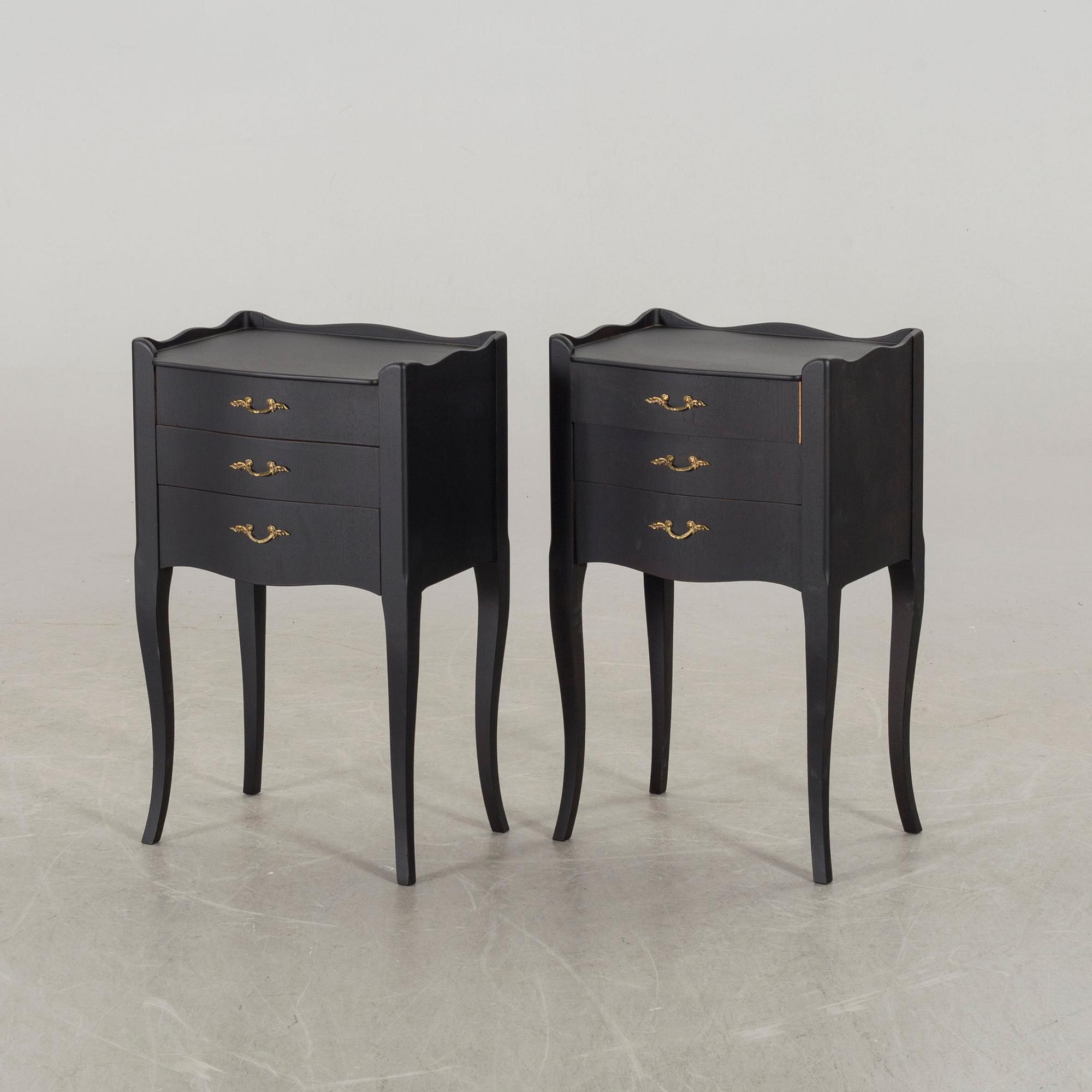A pair of painted bedside tables, second half of the 20th Century.