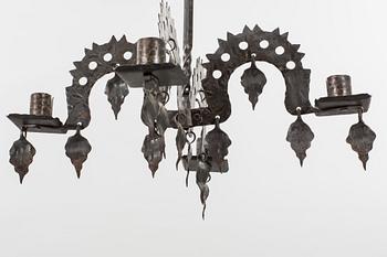 A FOLKLORE LAMP 20TH CENTURY.
