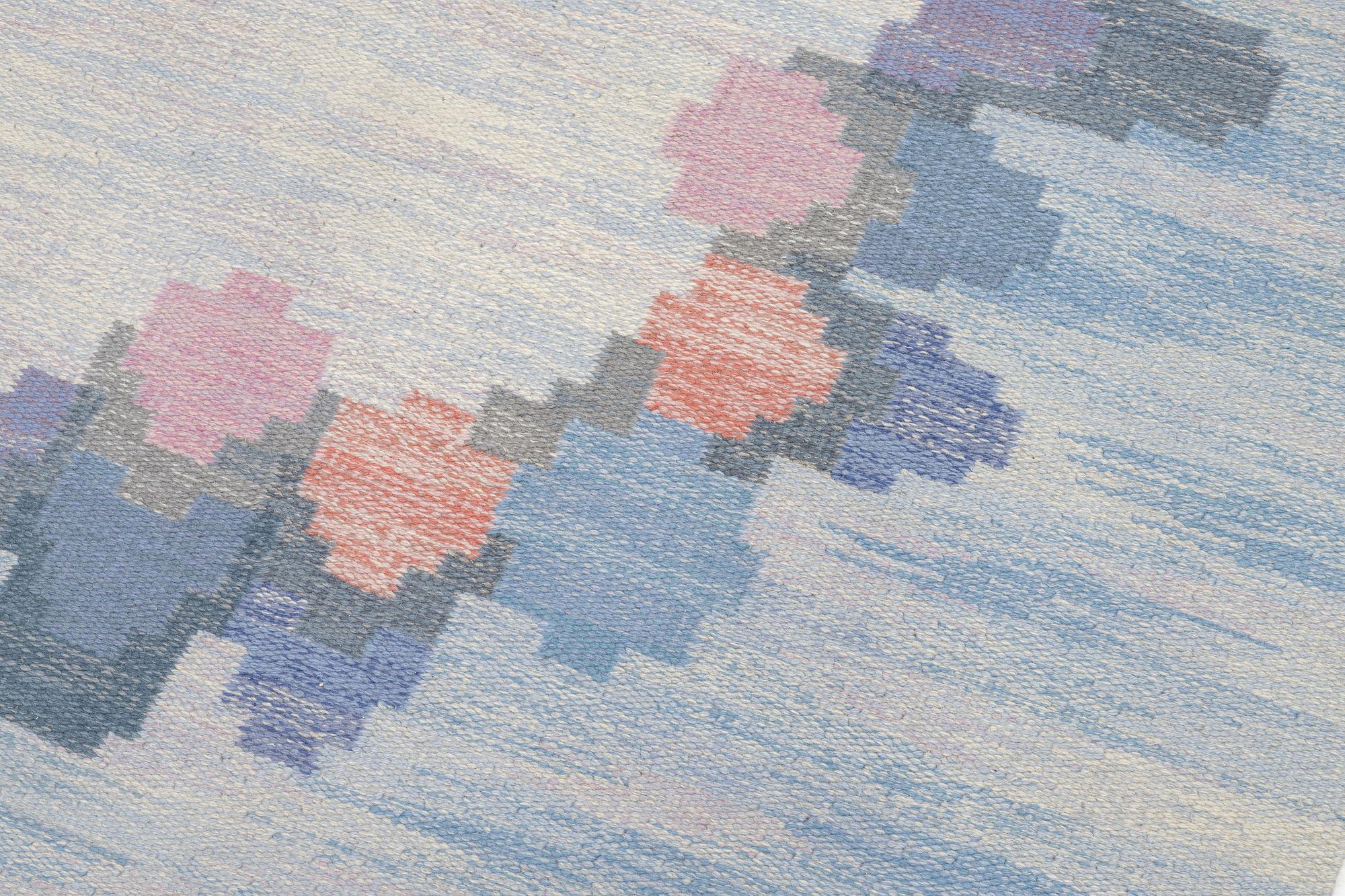 Judith Johansson, a carpet, 'Blomsterkrans', flat weave, c 273 x 208 cm, signed JJ.