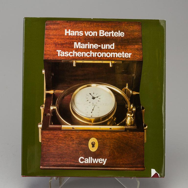 A set of 5 watch books.