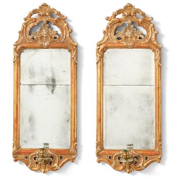 151. A pair of giltwood one-branch girandole mirrors by JP Larsson.
