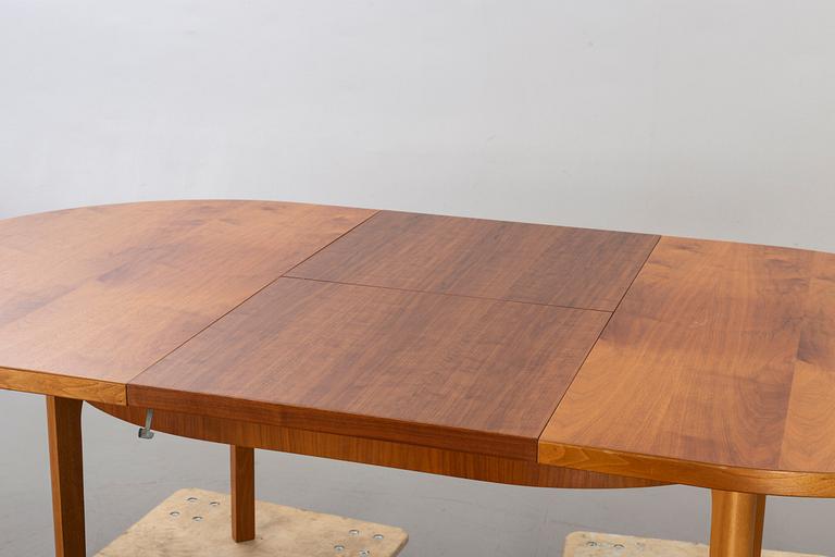 A second half of the 20th century walnut dining table.