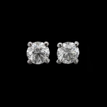206. A pair of brilliant cut diamond earrings, 0.60 each.