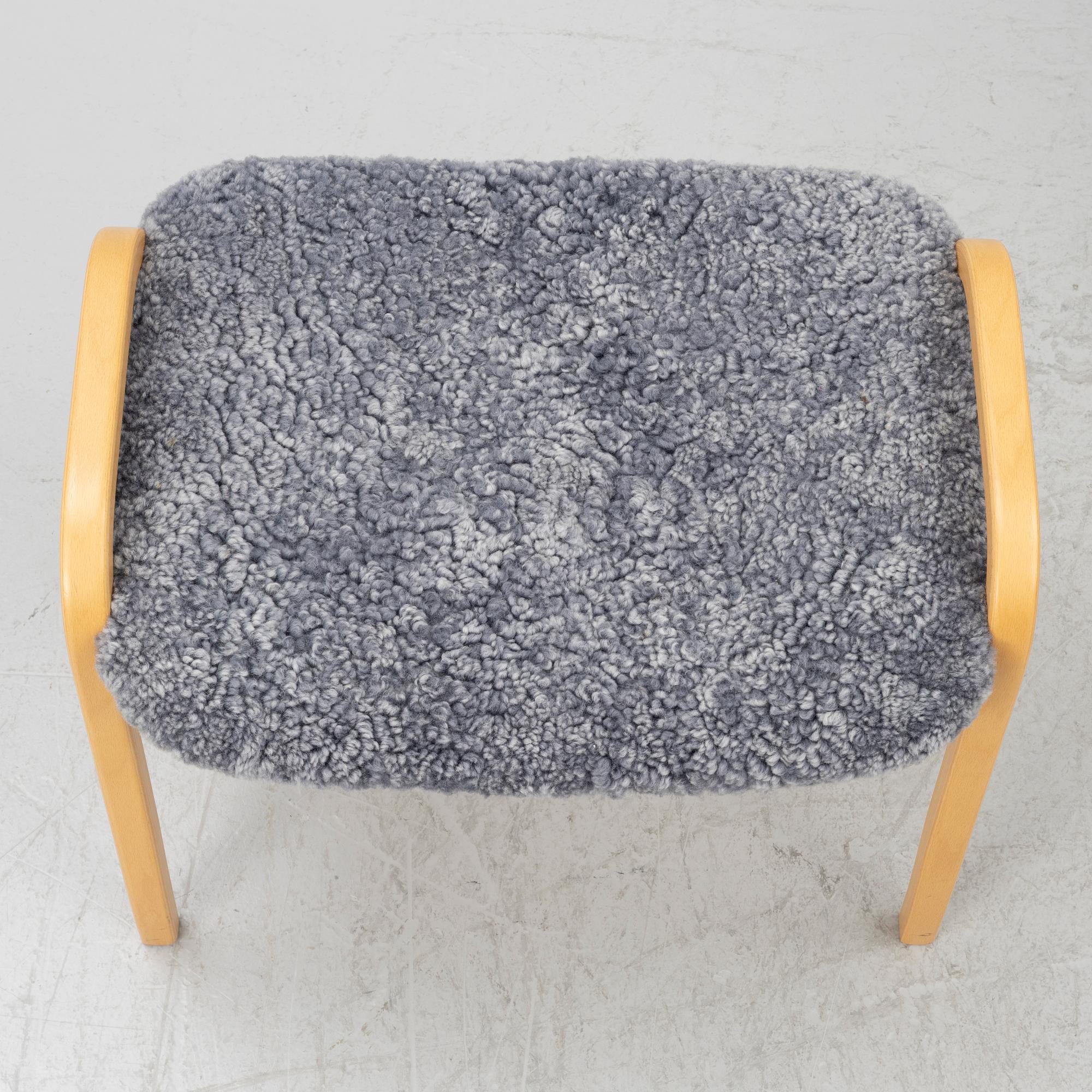 Yngve Ekström, armchair with footstool, Lamino, Swedese.