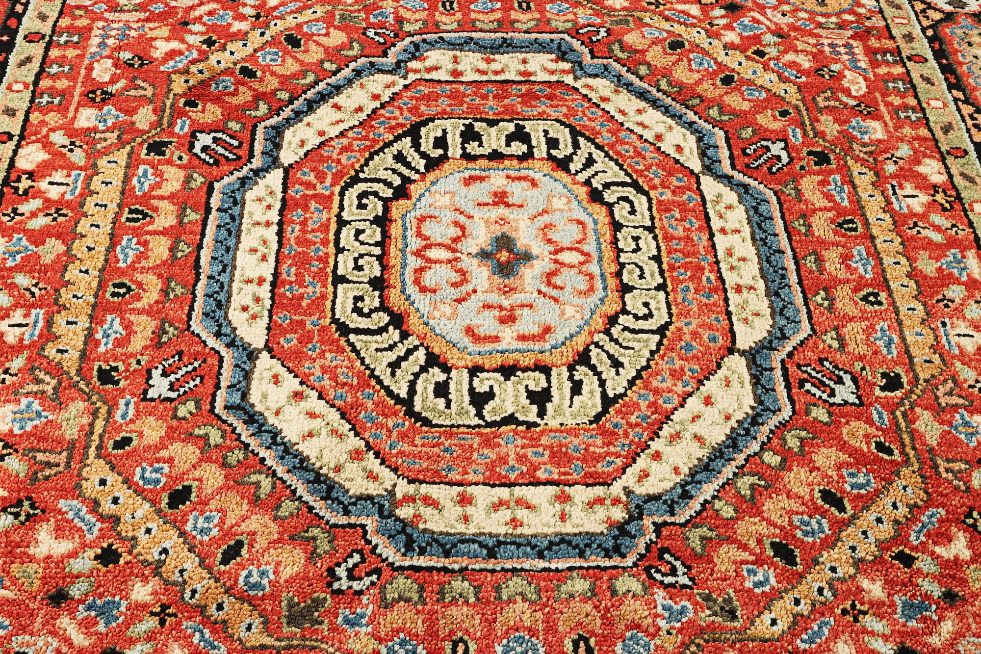 A Mamluk design carpet, c. 304 x 235 cm.