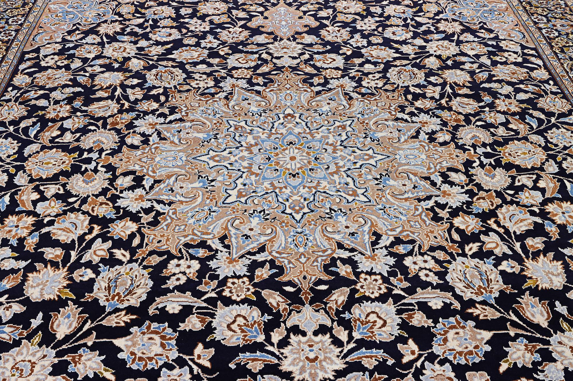 A Kashan carpet, c. 430 x 293 cm.