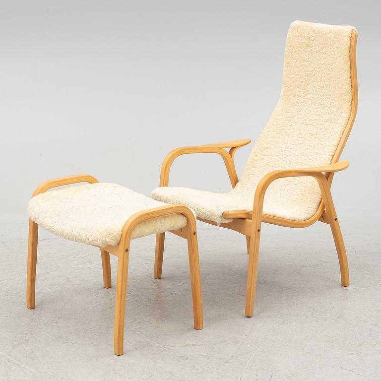 Yngve Ekström, a 'Lamino' armchair and ottoman, Swedese, 2002.