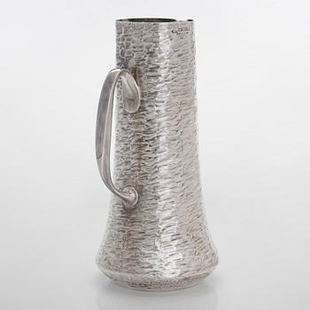 Tapio Wirkkala, a sterling silver pitcher with eight beakers, Hämeenlinna Finland 1973-1978.