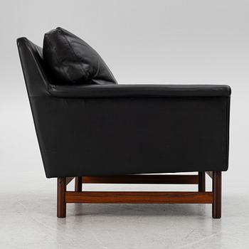 Two leather upholstered sofas and an armchair, IKEA, Sweden, 1960's/70's.