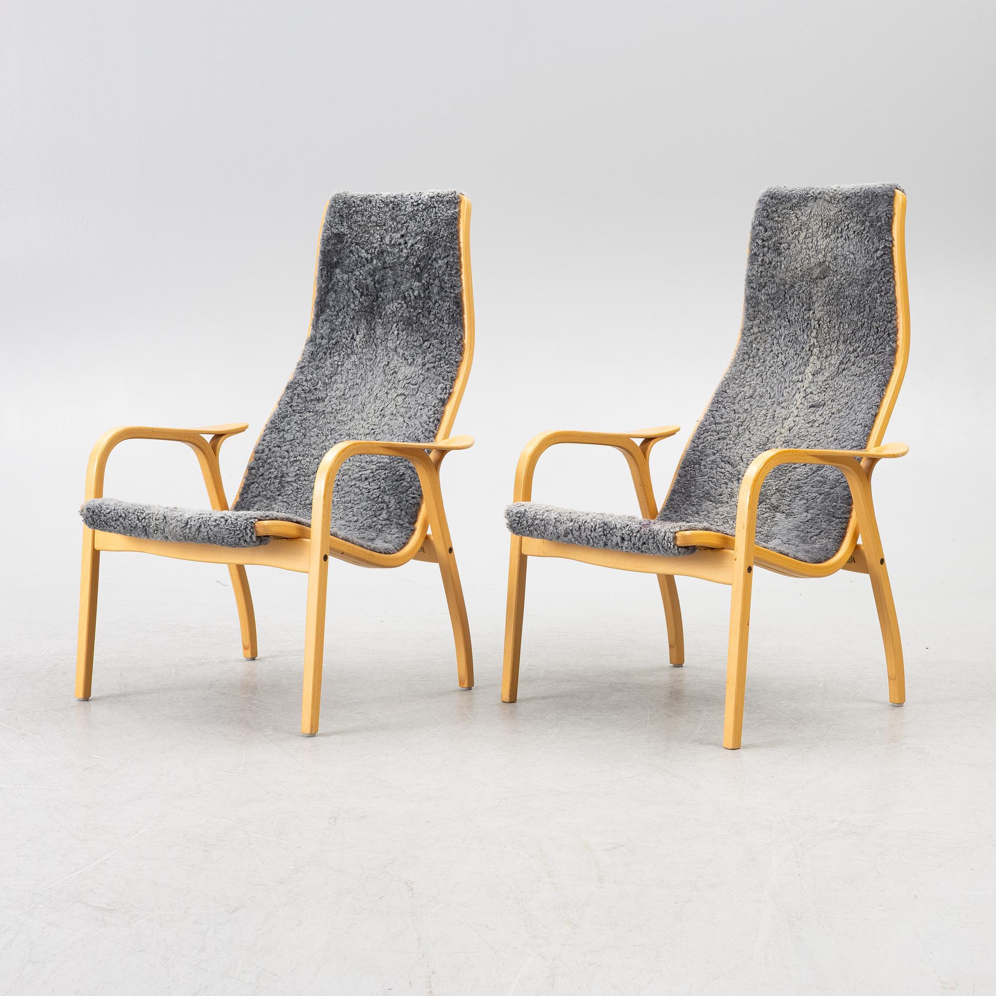 Yngve Ekström, a pair of 'Lamino' easy chairs, Swedese 2004.