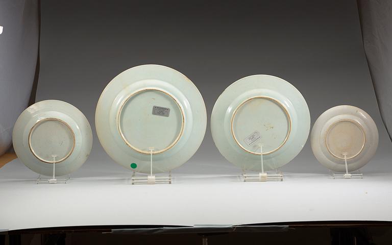 A set of four famille rose 'double peacock' dishes, Qing dynasty, Qianlong (1736-95).
