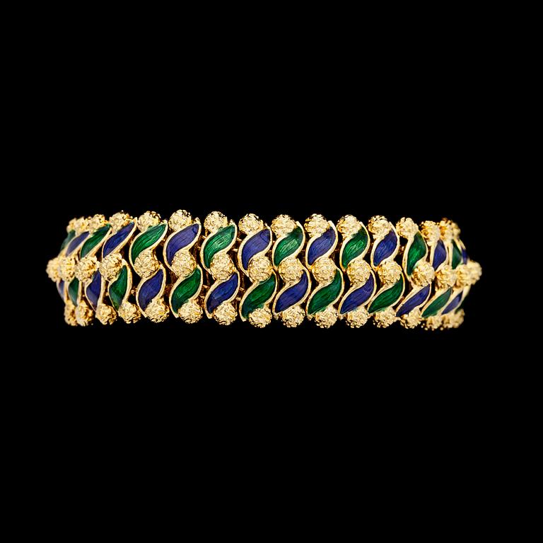 A green and blue enamel bracelet. Italy.