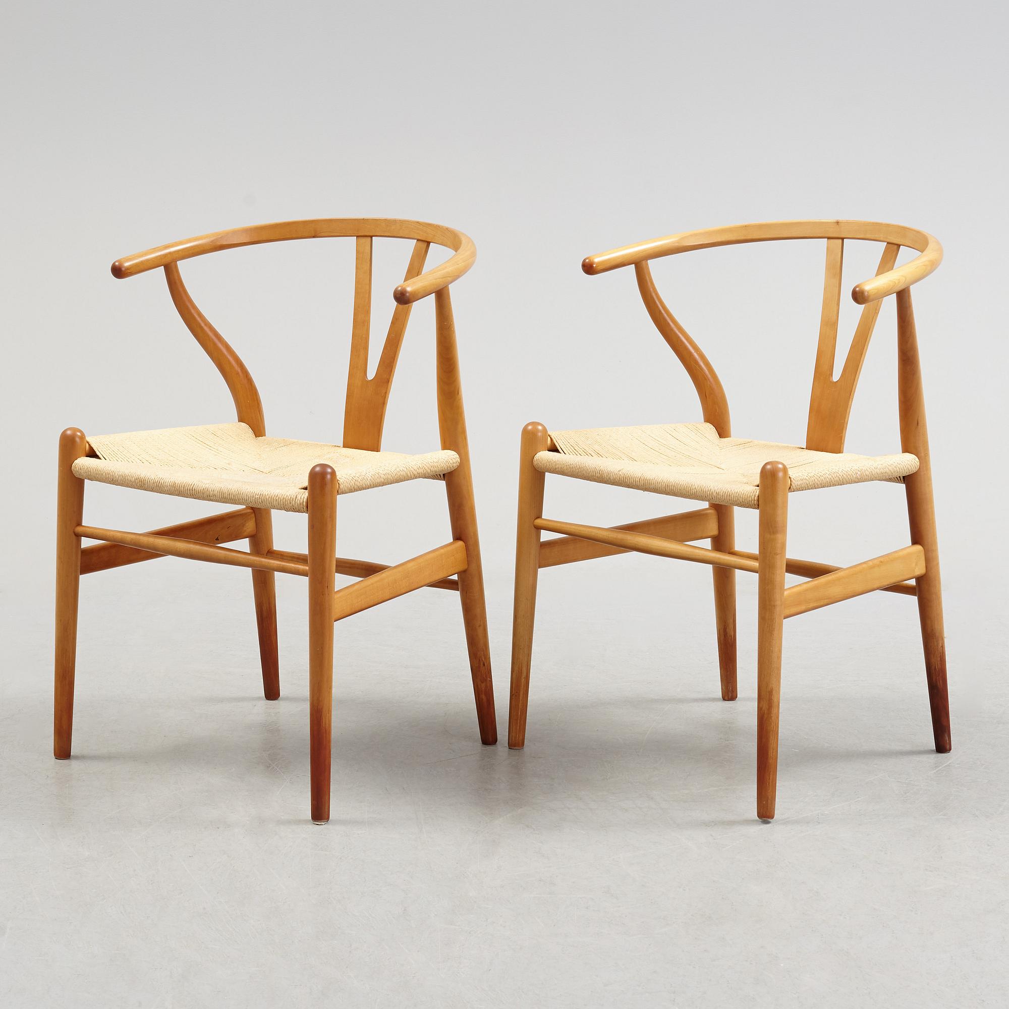 A set of four + two armchairs 'Y-chair' by Hans J Wegner, Carl Hansen & Son, Denmark.