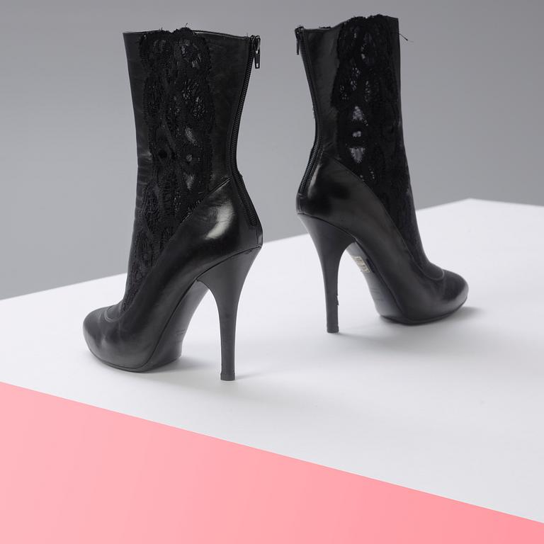 DOLCE & GABBANA, a pair of black leather & lace boots, Size 40 1/2.