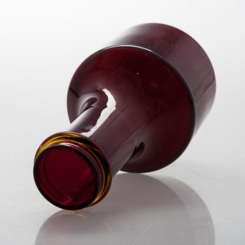 TAPIO WIRKKALA, A red glass bottle for Iittala, signed Tapio Wirkkala i 408.