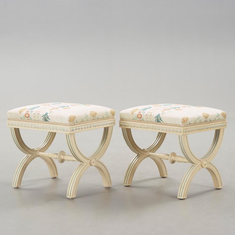 A pair of painted late gustavian stools by Ephraim Ståhl(active 1794-1820).