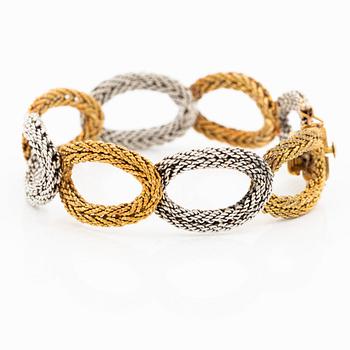 Armband 14K tvåfärgat guld i form av flätade ovala länkar, omkring ca 1950-70-tal.