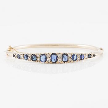 Arm ring of low carat gold with sapphires and old-cut diamonds.