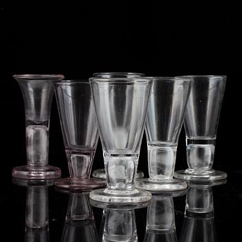 Six similar 18th century wine glasses.