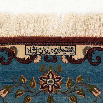 A signed Kashan 'Dabir' rug, ca 199 x 134 cm.