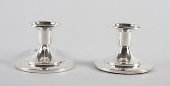 LJUSSTAKAR, ett par, silver, 1938.